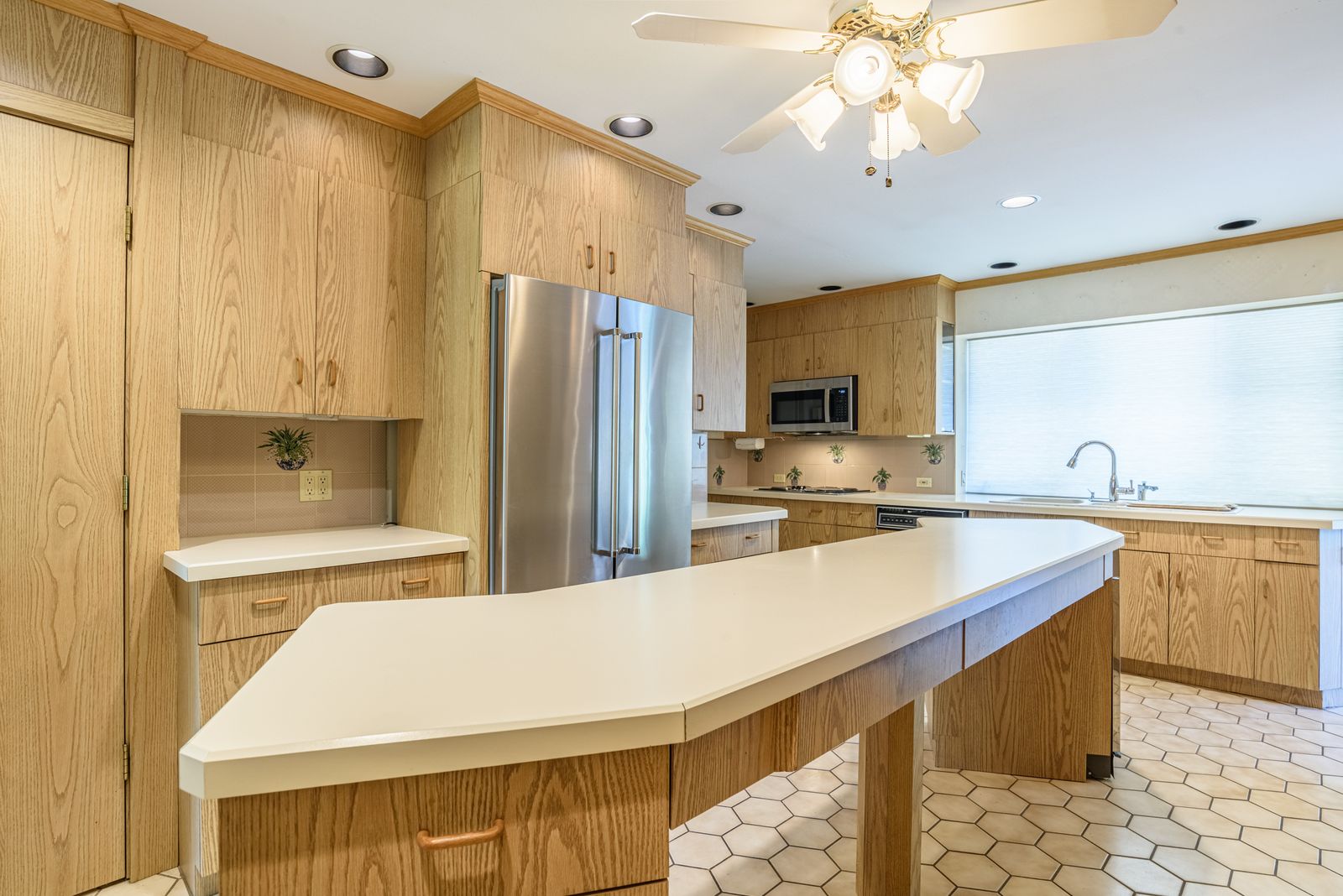 Kitchen island, wall ovens and built-ins