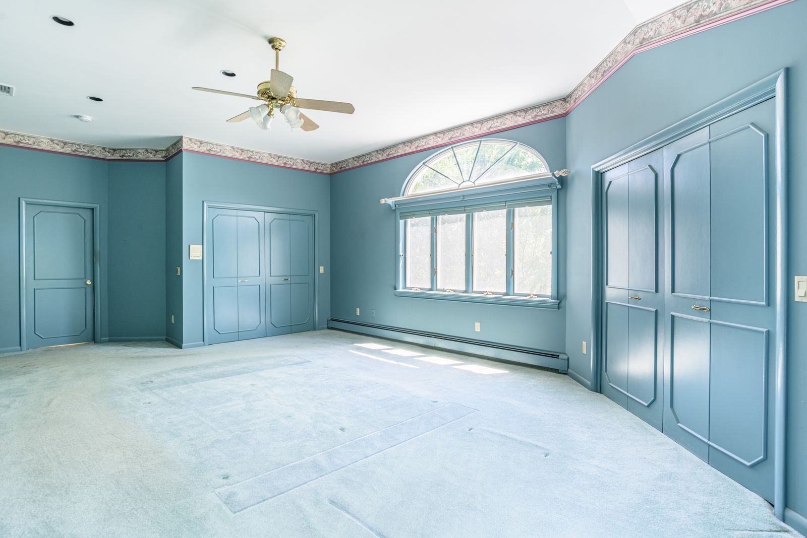 Primary suite with dressing area and built-ins